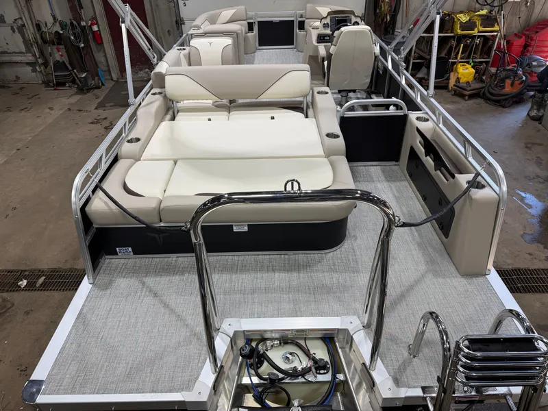 Slide: The Image of 2025 Tahoe Sport VRB 2385 Swingback interior view, luxurious seating, modern design. - 5