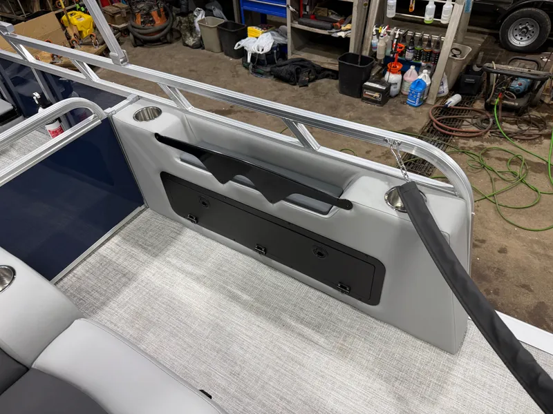 Slide: The Image of Interior of 2025 Tahoe Sport VRB 2385 Swingback with storage and cup holders. - 24