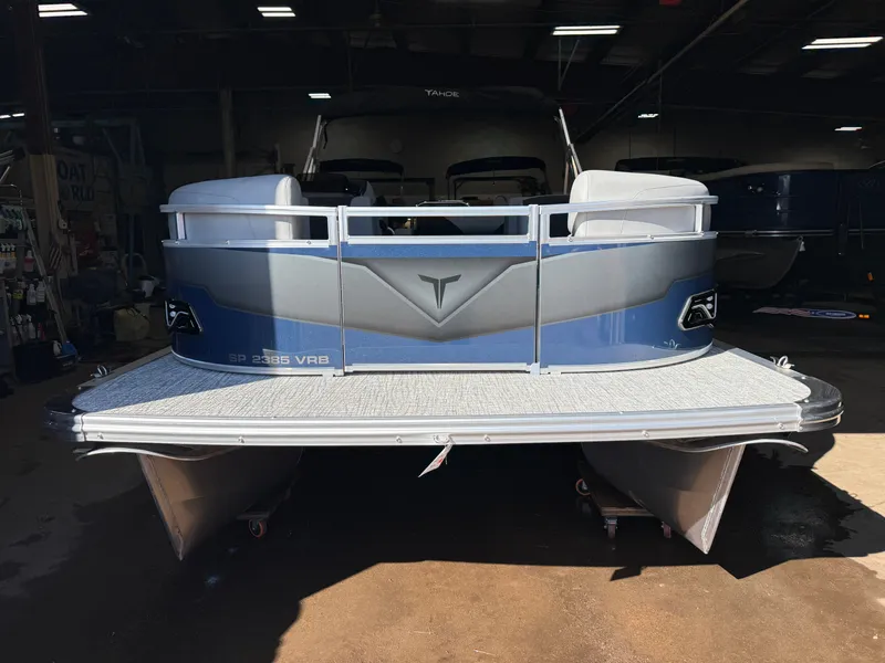 Slide: The Image of 2025 Tahoe Sport VRB 2385 Swingback boat in a workshop. - 36