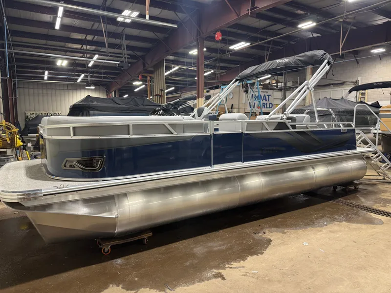 Slide: The Image of 2025 Tahoe Sport VRB 2385 pontoon boat in warehouse. - 39
