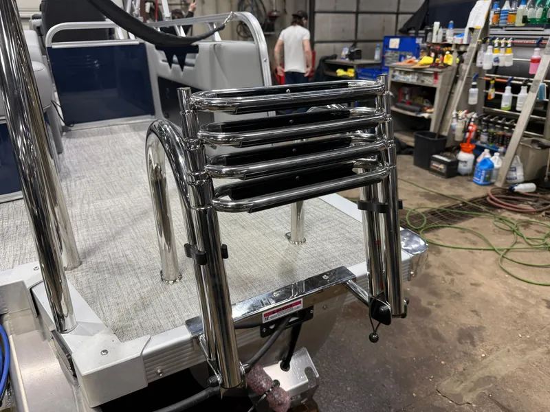 Slide: The Image of 2025 Tahoe Sport VRB 2385 boat with stainless steel ladder. - 44