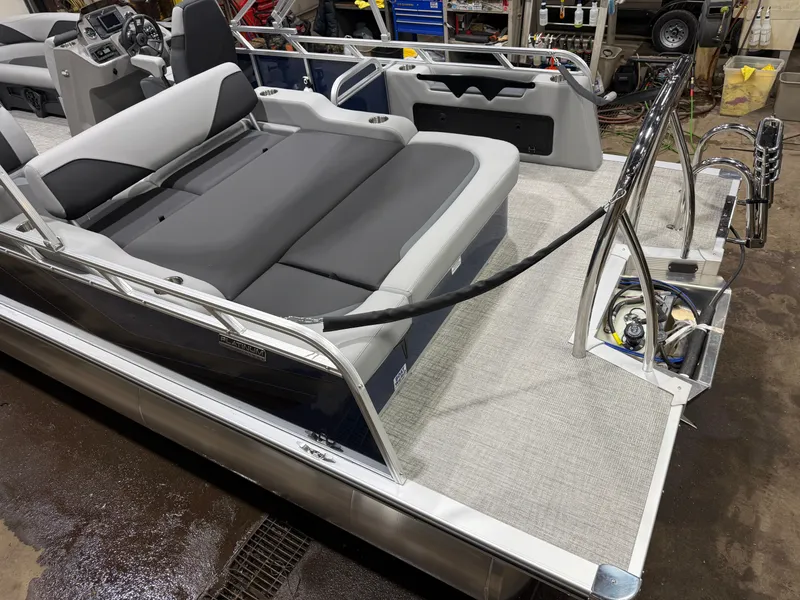 Slide: The Image of 2025 Tahoe Sport VRB 2385 Swingback pontoon boat interior view. - 5