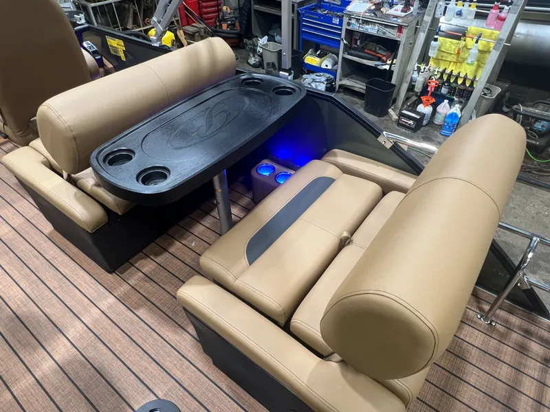 Slide: The Image of Interior of 2026 Bentley Pontoons Legacy 220 QSB with beige seating. - 24