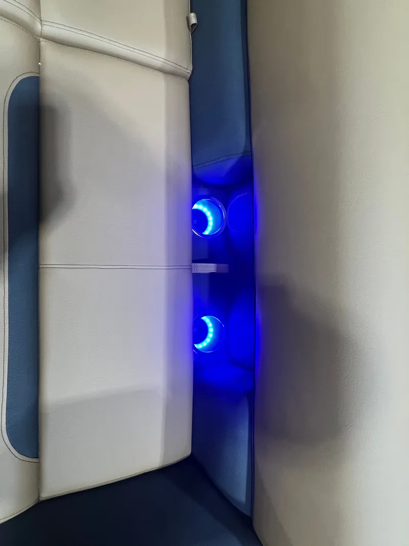 Slide: The Image of Interior of Bentley Pontoons Legacy 220 QSB with blue LED lighting. - 30