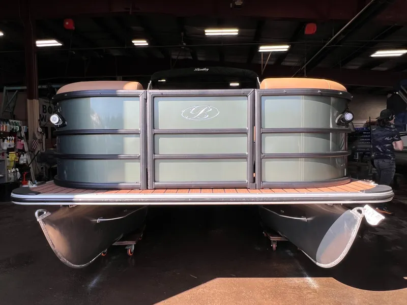 Slide: The Image of 2026 Bentley Pontoons Legacy 220 QSB Swingback in a workshop. - 43