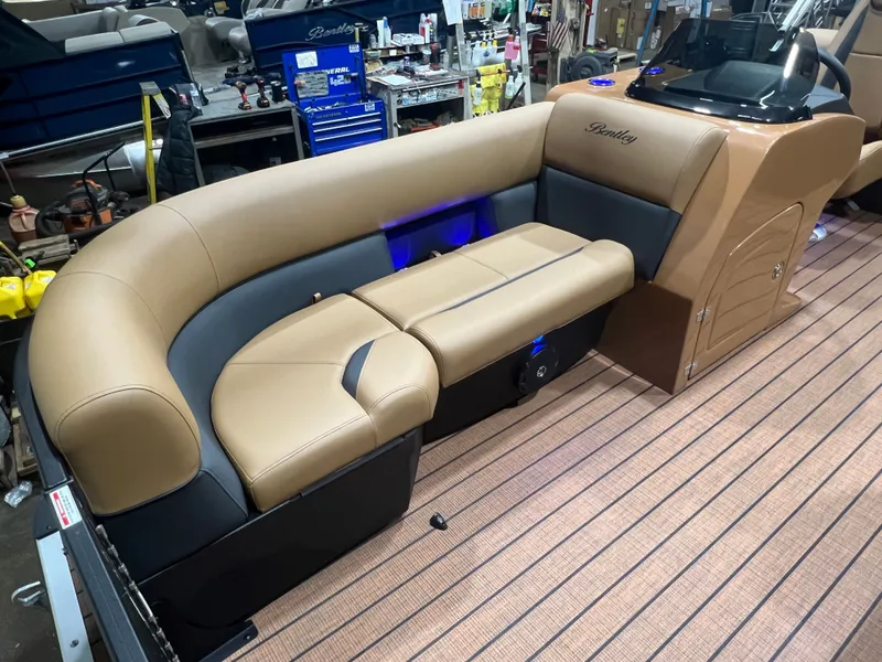 Slide: The Image of 2026 Bentley Pontoons Legacy 220 QSB with luxurious interior seating. - 6