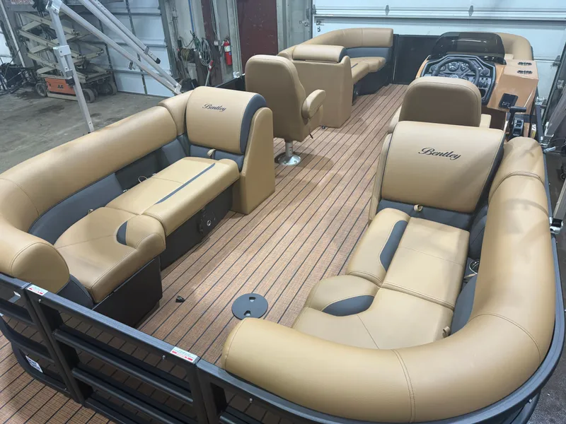 Slide: The Image of 2026 Bentley Pontoons Legacy 220 Navigator interior with luxurious seating. - 21