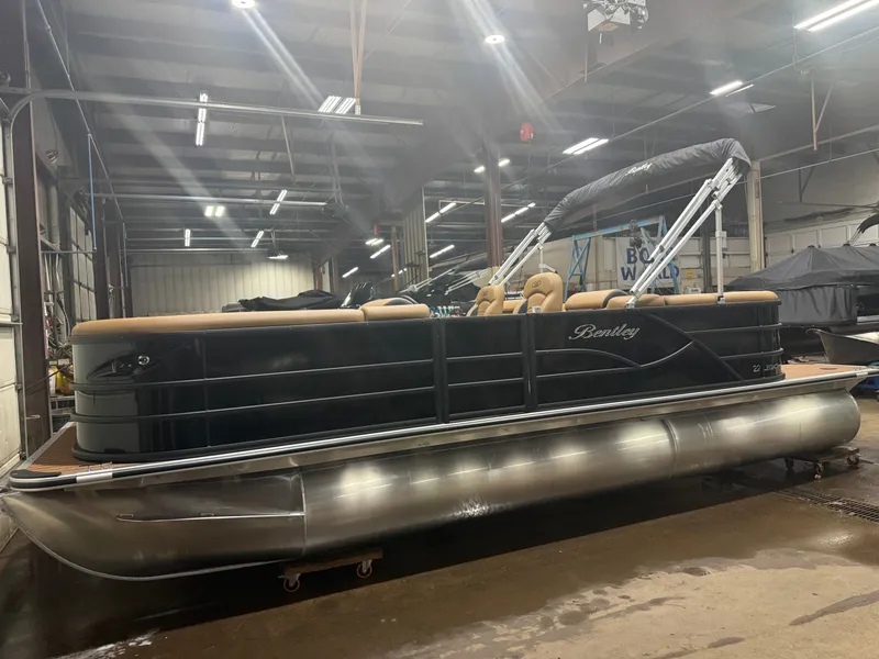 Slide: The Image of 2026 Bentley Pontoons Legacy 220 Navigator indoors. - 32