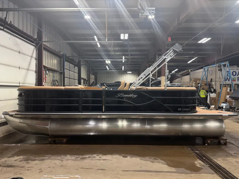 Slide: The Image of 2026 Bentley Pontoons Legacy 220 Navigator displayed indoors. - 38