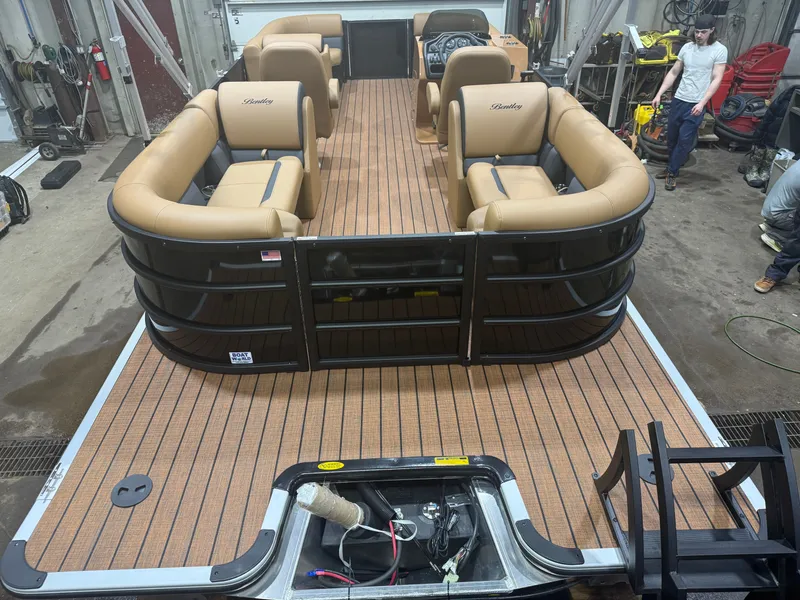 Slide: The Image of 2026 Bentley Pontoons Legacy 220 Navigator in factory setting. - 6