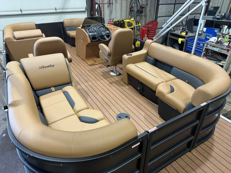 Slide: The Image of Interior of 2026 Bentley Pontoons Legacy 220 Navigator with luxurious seating. - 19