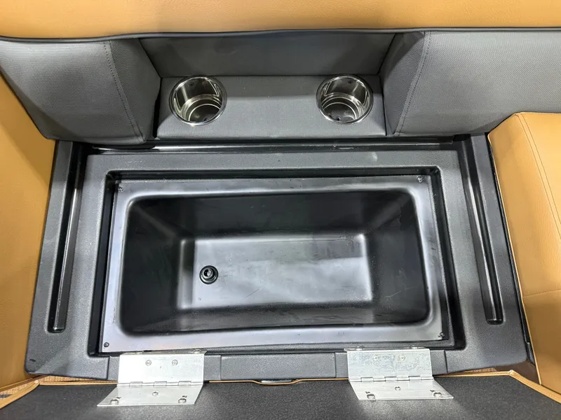 Slide: The Image of Interior of Bentley Pontoons Legacy 220 with cup holders and storage compartment. - 21