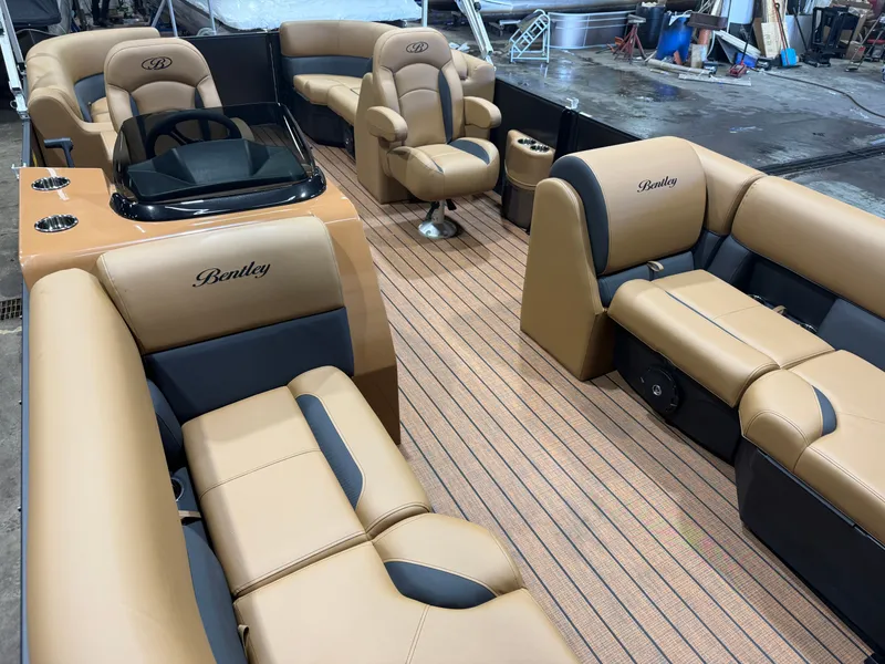 Slide: The Image of Interior of 2026 Bentley Pontoons Legacy 220 Navigator, luxurious seating and design. - 28