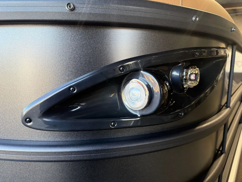 Slide: The Image of Close-up of 2026 Bentley Pontoons Legacy 220 Navigator headlight. - 30