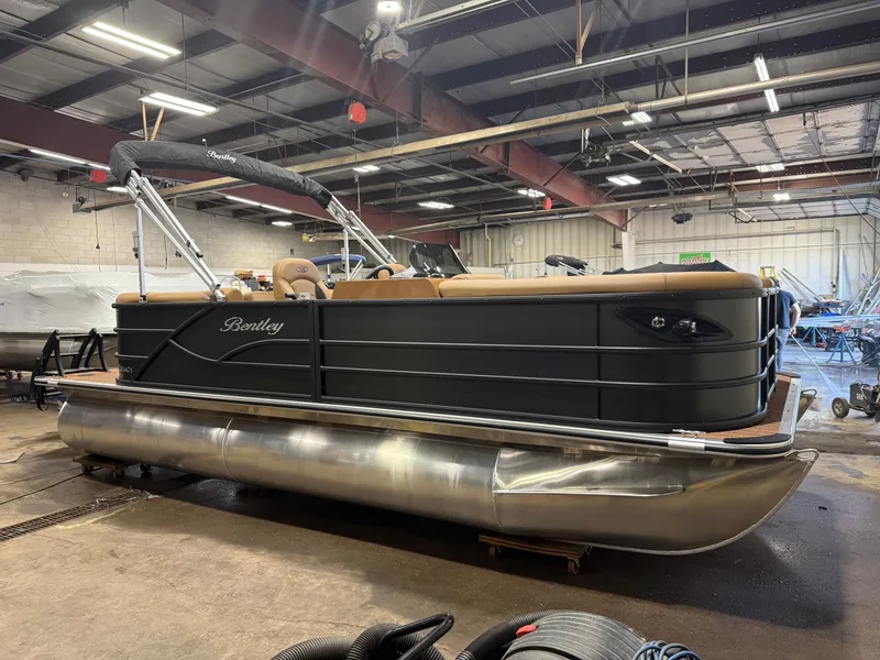 Slide: The Image of 2026 Bentley Pontoons Legacy 220 Navigator in warehouse. - 37
