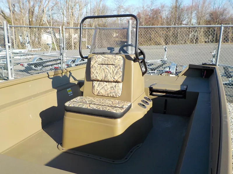 Slide: The Image of 2026 G3 Gator Tough Jon boat with camouflage seats. - 4