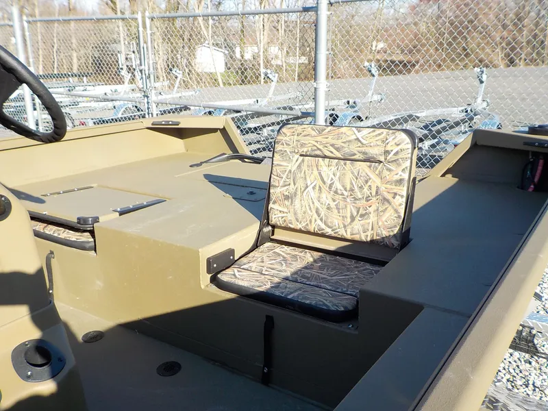 Slide: The Image of 2026 G3 Gator Tough Jon boat with camouflage seat. - 9