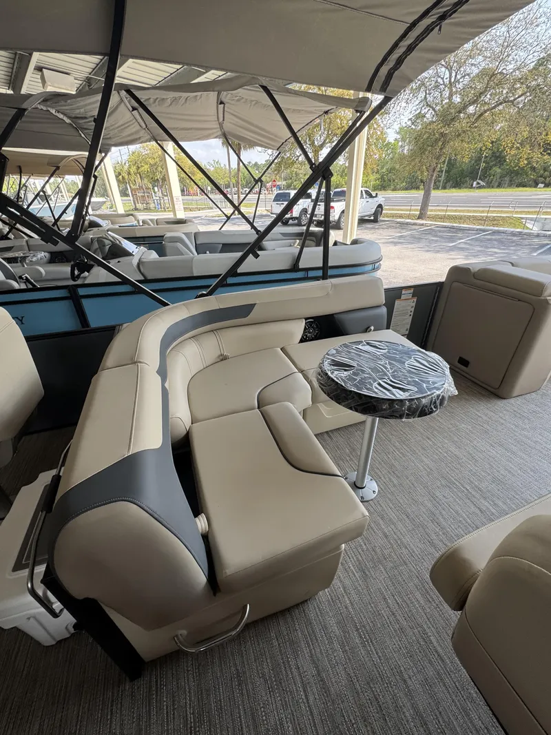 Slide: The Image of Interior of 2026 Godfrey SW 2286 Fish Stern with beige seating. - 15