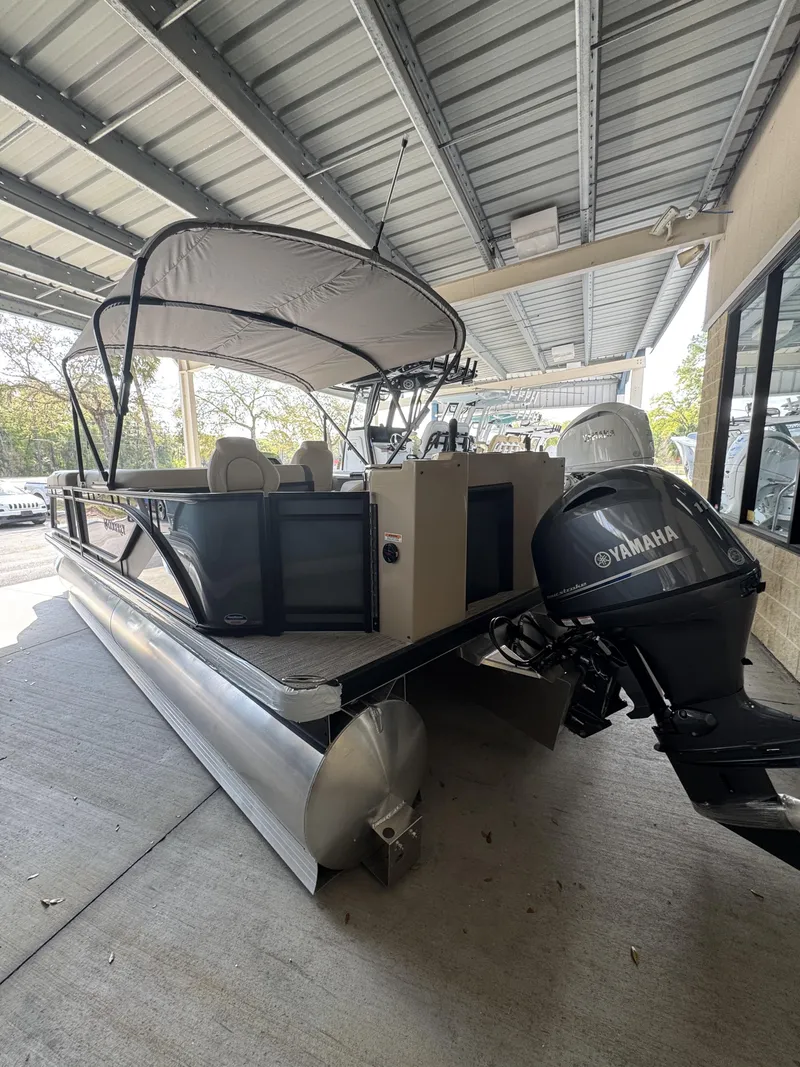 Slide: The Image of Godfrey SW 2286 Fish Stern 2026 with Yamaha engine under canopy. - 31