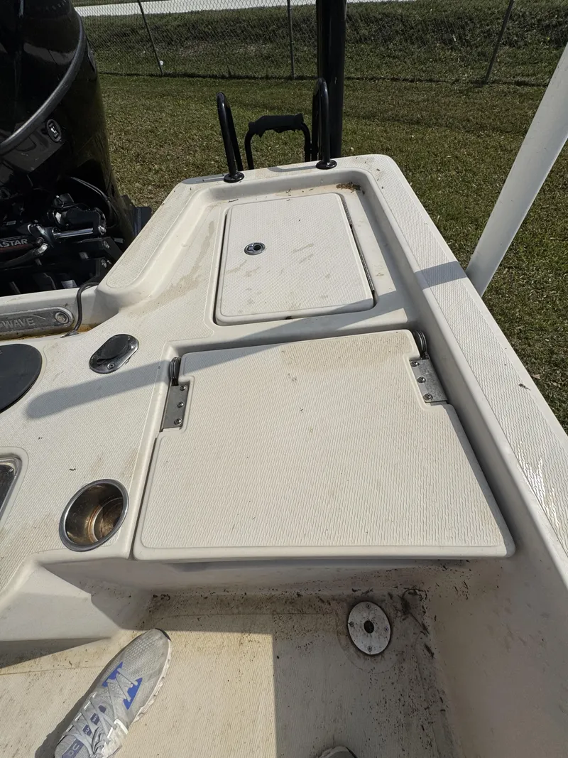 Slide: The Image of 2020 Blue Wave 2200 PureBay boat deck with storage compartments. - 29