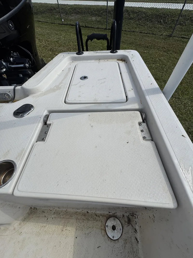 Slide: The Image of 2020 Blue Wave 2200 PureBay boat deck with storage compartments. - 31