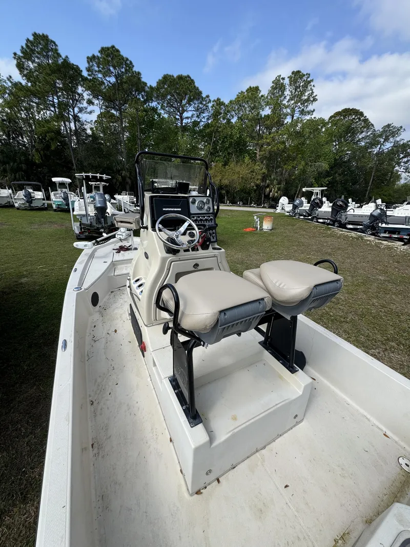 Slide: The Image of 2020 Blue Wave 2200 PureBay boat parked outdoors. - 32