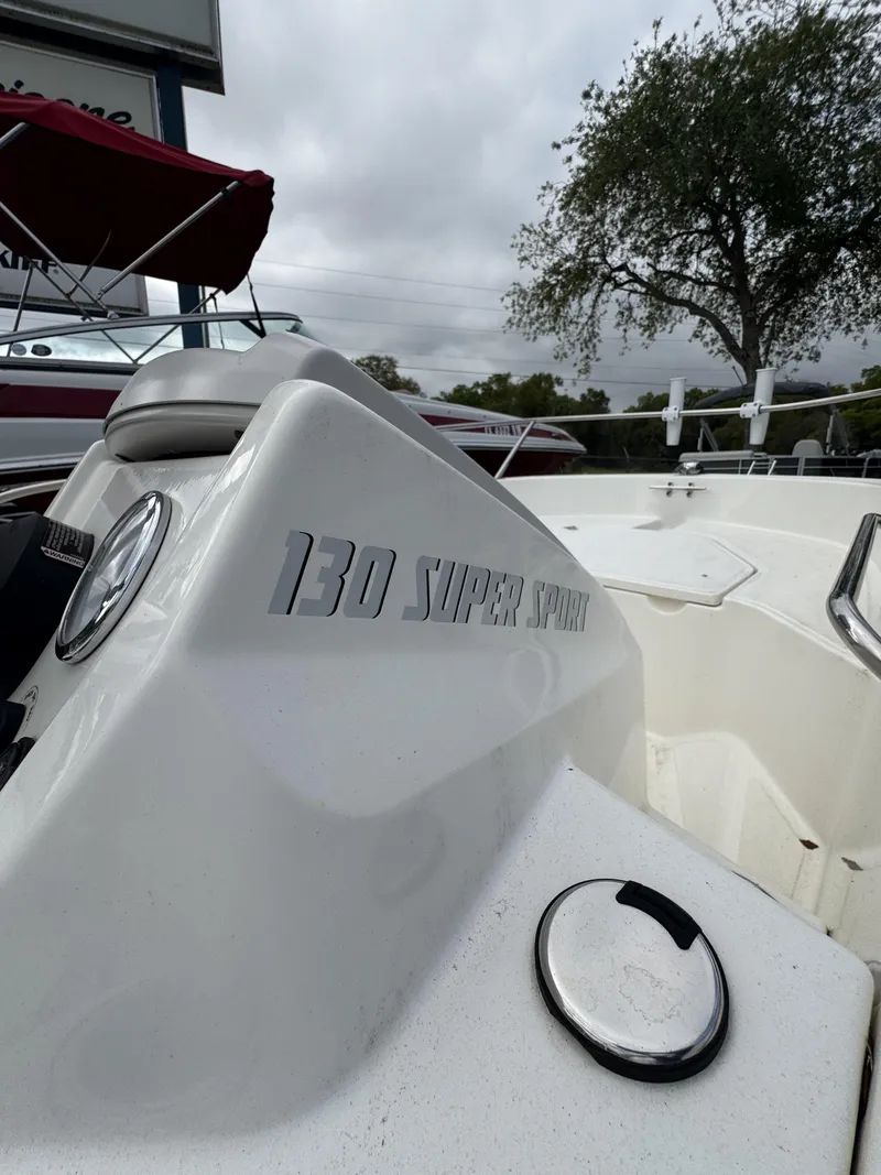 Slide: The Image of 2024 Boston Whaler 130 Super Sport boat, close-up of helm. - 8