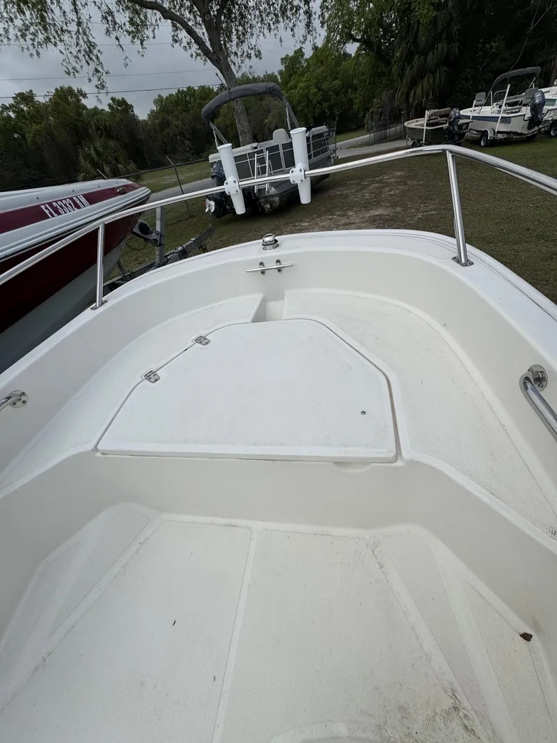 Slide: The Image of 2024 Boston Whaler 130 Super Sport boat bow view. - 9