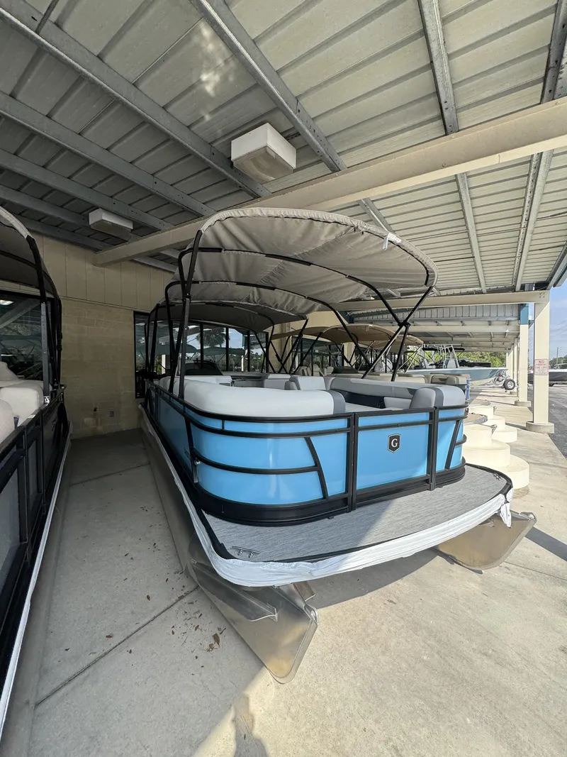 Slide: The Image of 2026 Godfrey SW 2286 Cruise Special Edition pontoon boat under canopy. - 21