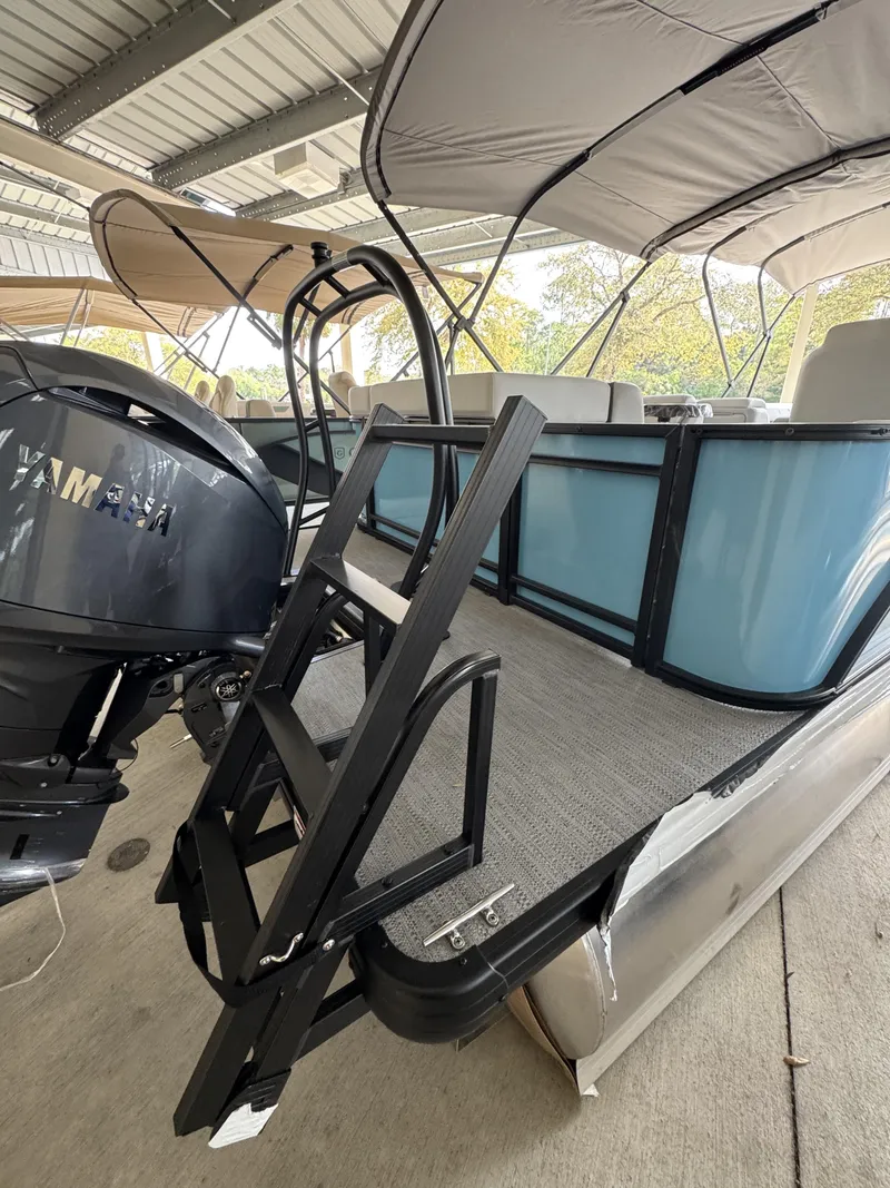 Slide: The Image of Godfrey SW 2286 Cruise Special Edition 2026 with Yamaha motor and ladder. - 22