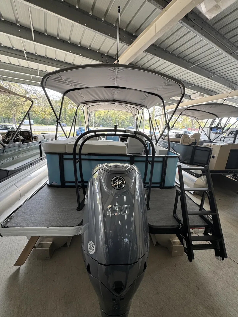 Slide: The Image of Godfrey SW 2286 Cruise Special Edition 2026 with motor and canopy. - 24