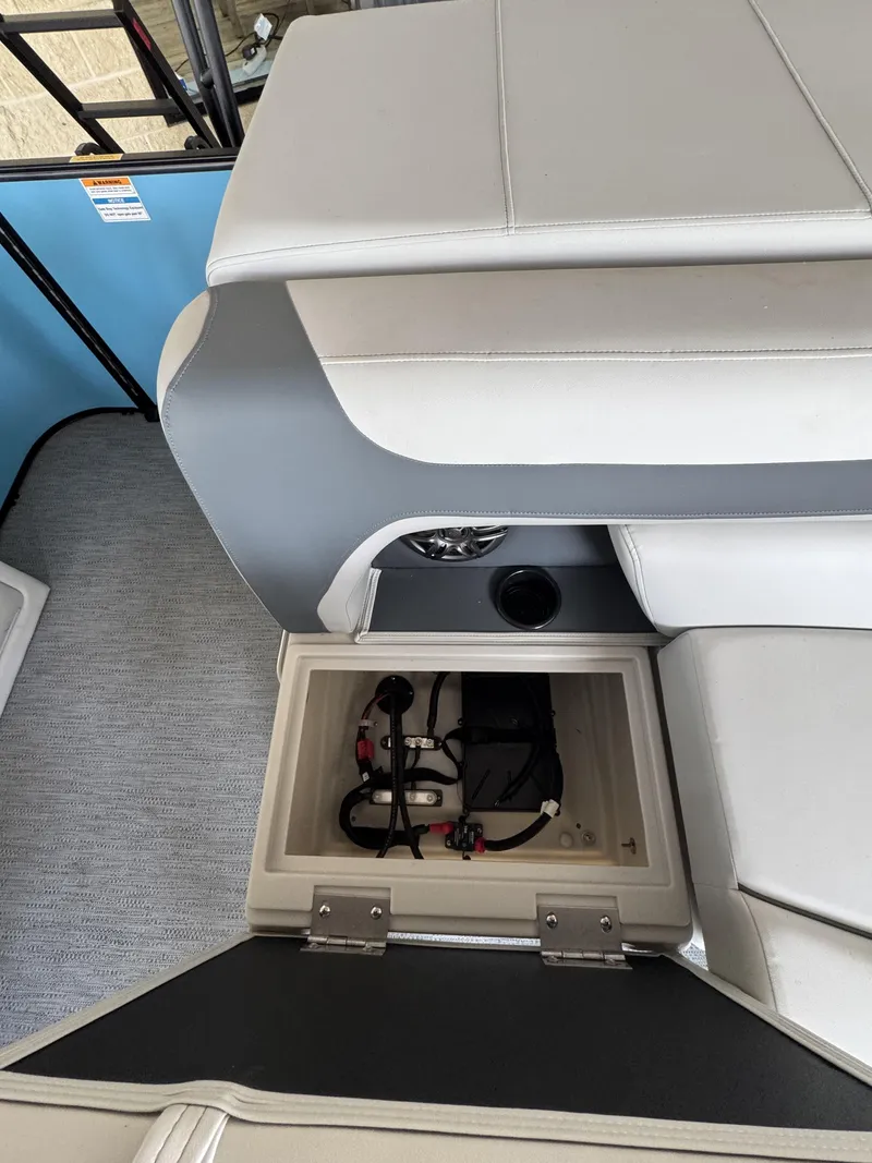 Slide: The Image of Interior of Godfrey SW 2286 Cruise Special Edition 2026 with storage compartment. - 9