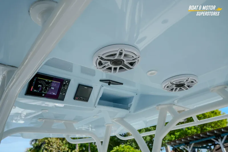 Slide: The Image of 2020 Yellowfin 32 Offshore boat interior with speakers and electronic display. - 19