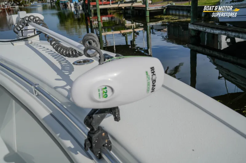 Slide: The Image of 2020 Yellowfin 32 Offshore boat with Rhodan trolling motor on a calm waterway. - 26