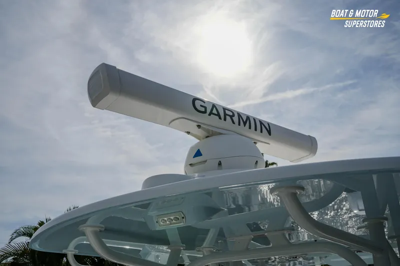 Slide: The Image of Garmin radar on 2020 Yellowfin 32 Offshore boat under a sunny sky. - 35