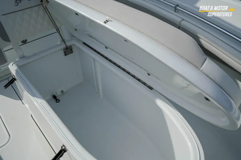 Slide: The Image of Open storage compartment on a 2020 Yellowfin 32 Offshore boat. - 42