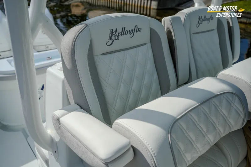 Slide: The Image of Luxury seating on 2020 Yellowfin 32 Offshore boat, featuring elegant stitching and branding. - 46