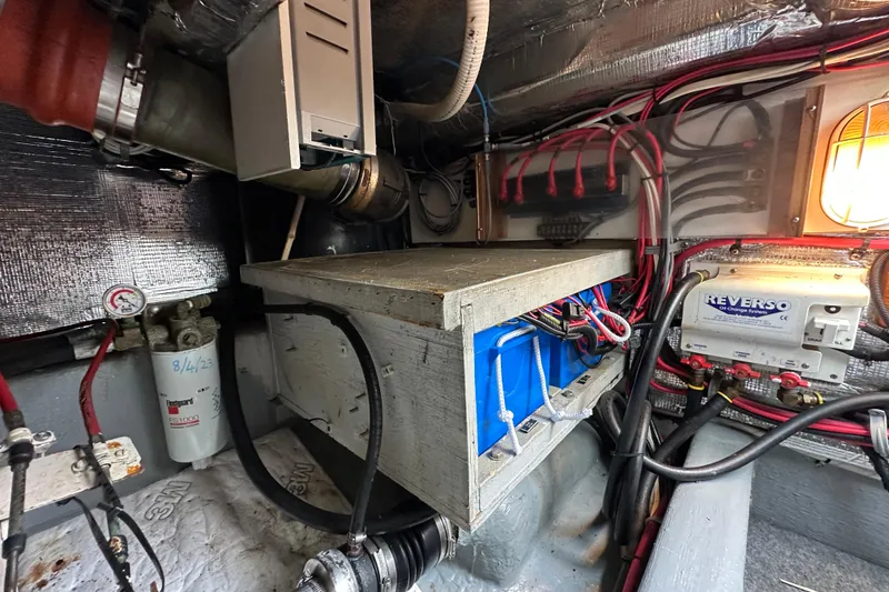 Slide: The Image of Engine room of 2002 Skipjack 36 Flybridge with wiring and equipment. - 25