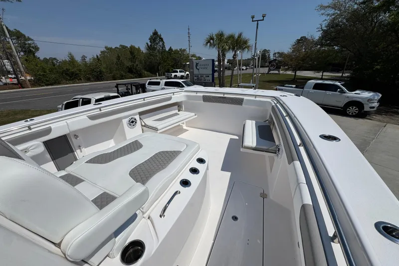 Slide: The Image of 2025 Caymas 34 CT boat interior with white seating and modern design. - 19