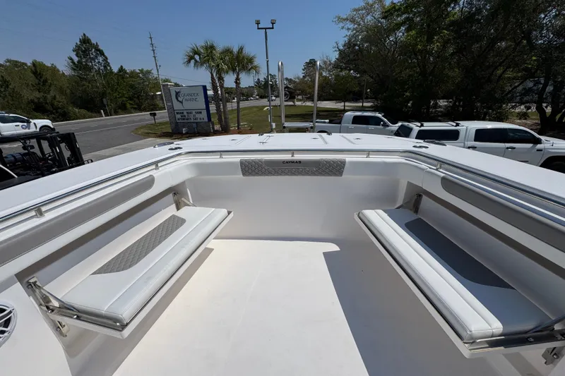 Slide: The Image of 2025 Caymas 34 CT boat interior with white seating and sleek design. - 20