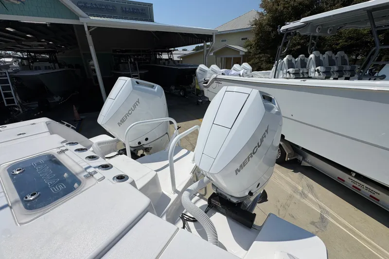 Slide: The Image of 2025 Caymas 34 CT boat with dual Mercury engines at Grander Marine. - 45