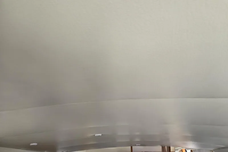 Slide: The Image of Interior ceiling of a 1994 Navigator 5600 yacht, featuring recessed lighting. - 13