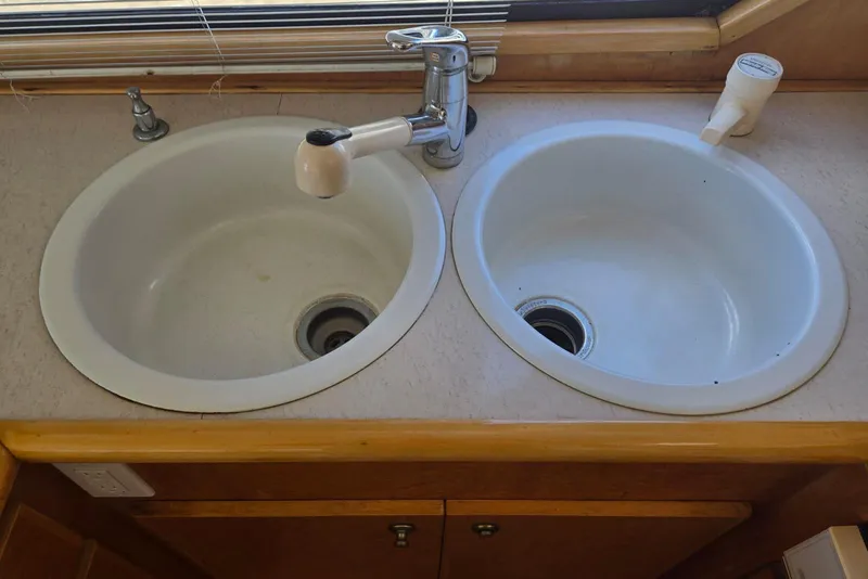 Slide: The Image of Double sink with faucet in 1994 Navigator 5600 boat kitchen. - 17