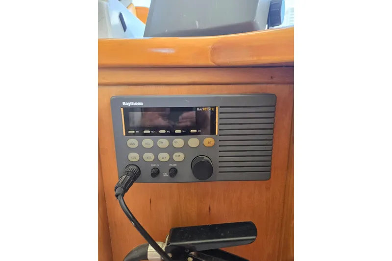 Slide: The Image of VHF radio on Navigator 5600, 1994 model, mounted on wooden panel. - 22