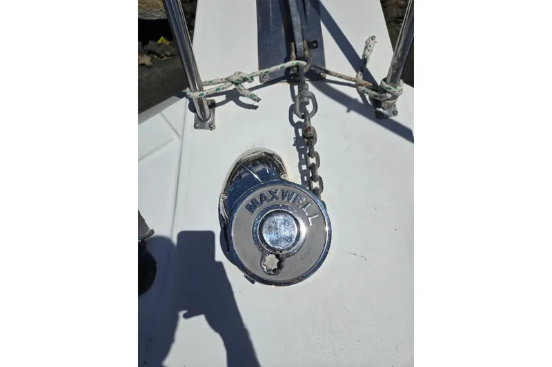 Slide: The Image of Anchor windlass on 1994 Navigator 5600 boat deck, featuring Maxwell branding. - 39