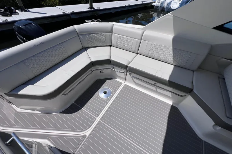 Slide: The Image of 2022 Sea Ray Sundancer 320 Coupe Outboard with luxurious seating and sleek design. - 15