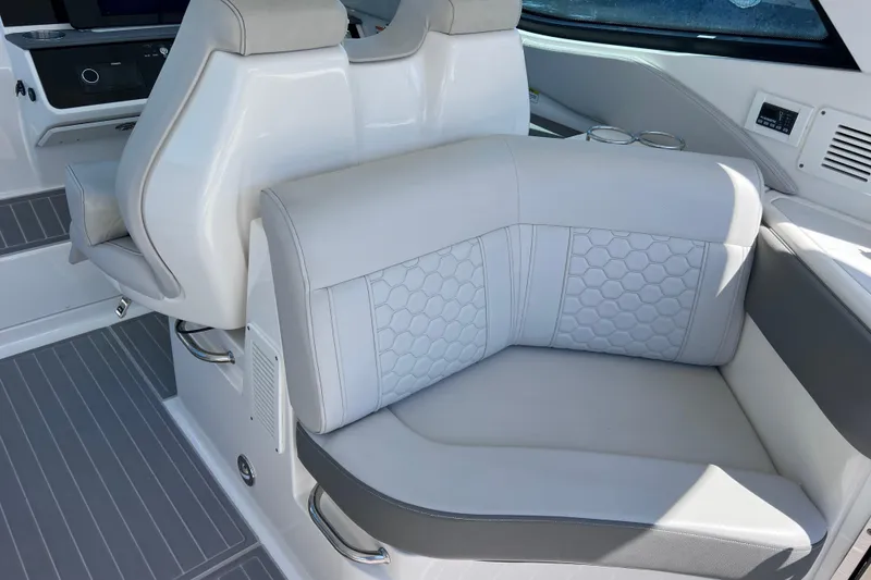 Slide: The Image of Luxurious seating on 2022 Sea Ray Sundancer 320 Coupe Outboard, featuring modern design and comfort. - 19