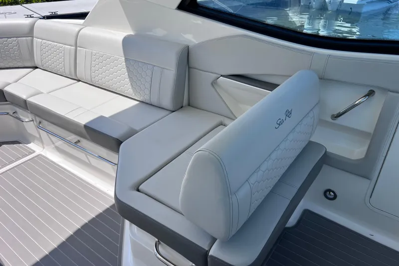 Slide: The Image of Luxurious seating on 2022 Sea Ray Sundancer 320 Coupe Outboard boat, featuring elegant upholstery. - 21