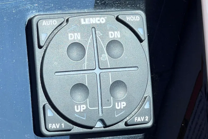 Slide: The Image of Lenco trim tab control panel on 2022 Sea Ray Sundancer 320 Coupe Outboard. - 27