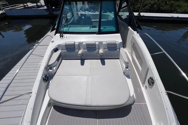 Slide: The Image of 2022 Sea Ray Sundancer 320 Coupe Outboard with spacious seating and sleek design. - 33